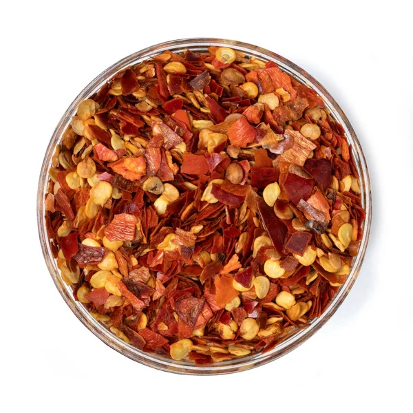 Spice Top View Beyaz Arkaplanda izole edilmiş tohumlarla ezilmiş Red Hot Pepper