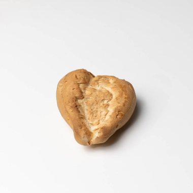 Geleneksel ekmek şekilleri, sert hamurlu irmik ekmeği. Tipik şekiller: Panuzzu, Heart, Rose - Rosetta