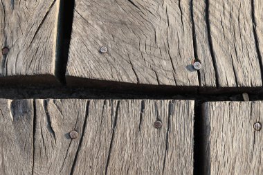 Close-up of nailed planks on a wooden bridge surface. Texture. clipart