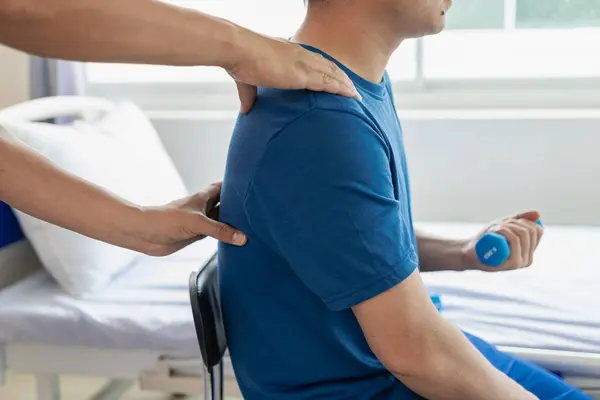 Physical Therapist Working Treatment Injured Arm Asian Male Athlete Patient — Stock Photo, Image
