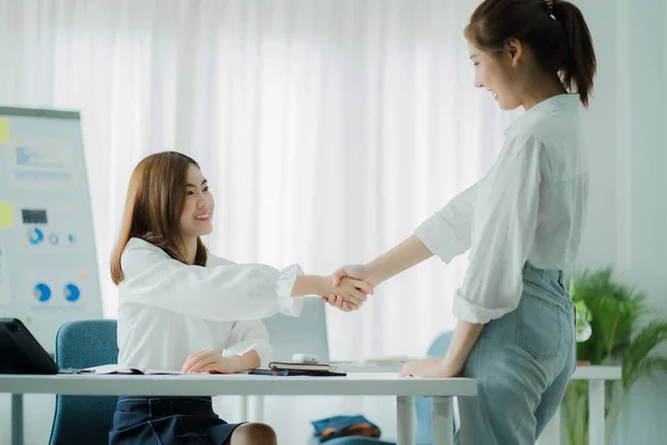 business woman Interviews and handshakes to support deals, contracts, and hiring in the office. Handshakes, partnerships, and successful recruiting.