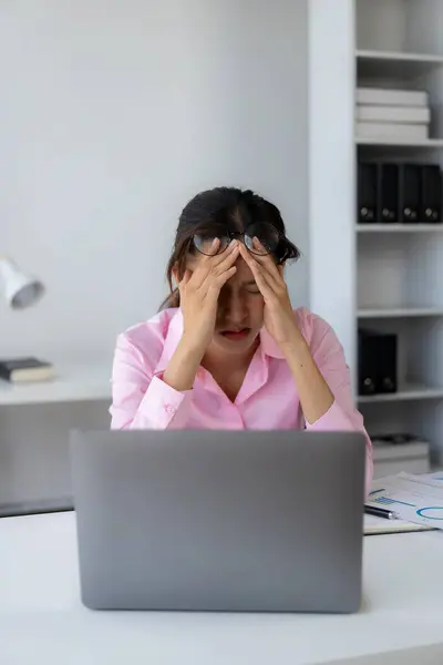 Young Asian Woman Puts Her Hands Her Head Feeling Tired — Stock Photo, Image