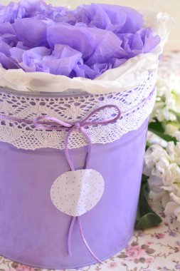 Wedding favors purple basket wrapped gifts white lace ribbon, mockup copy space label, baby baptism communion souvenirs for guests, spring summer floral event decoration, vertical view