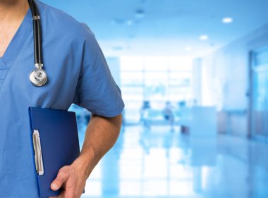 hospital doctor holding stethoscope and clipboard at work clipart