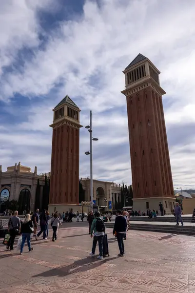 Stock image Amidst the bustling Plaa d'Espanya, the Venetian Towers stand as majestic sentinels, welcoming visitors to the vibrant heart of Barcelona. These twin towers, inspired by Renaissance architecture