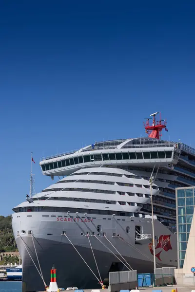 stock image Barcelona, Spain - September 15, 2024: Virgin Cruises' Lady Violet anchored in the picturesque Barcelona harbor, seen from the sea