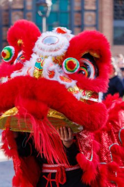 Barcelona - Spain, 25 January 2025: Performers showcase red dragon dances in a vibrant celebration of Chinese New Year clipart