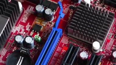 detail of the PCI Express (Peripheral Component Interconnect Express) slots on a modern PC motherboard.