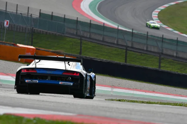 stock image Scarperia, 23 March 2023: Audi R8 LMS GT3 EVO II of Saintloc Junior Team driven by Bastard-Evrard in action during 12h Hankook Race at Mugello Circuit in Italy.