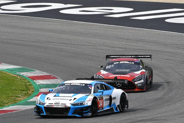 stock image Scarperia, 23 March 2023: Audi R8 LMS GT3 EVO II of Team Land Motorsport driven by Johannes Kirchhoff-Ingo Vogler-Tim Vogler in action during 12h Hankook Race at Mugello Circuit in Italy.