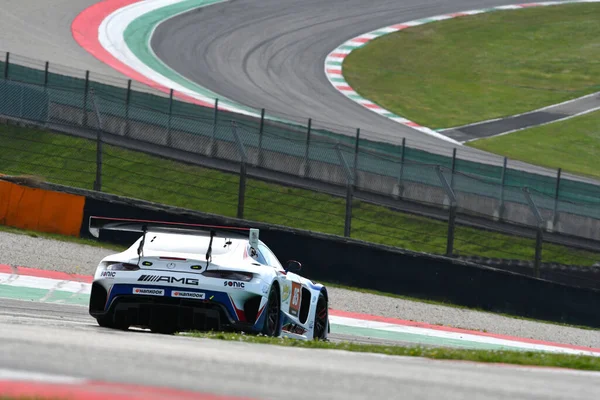 stock image Scarperia, 23 March 2023: Mercedes-AMG GT3 of Team CP Racing driven by Charles Putman-Charles Espenlaub-Shane Lewis in action during 12h Hankook Race at Mugello Circuit in Italy.