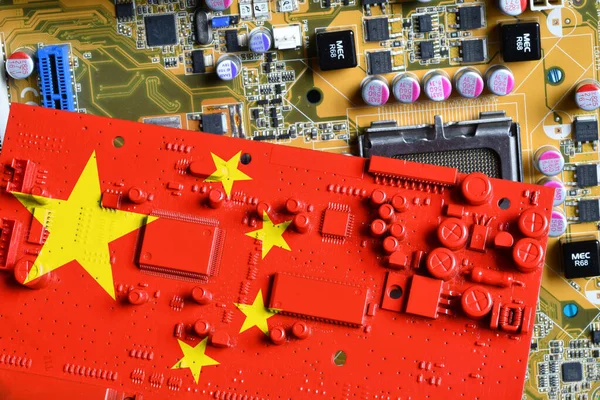 Flag of the Republic of China on a red painted printed circuit board. Concept for supremacy in global microchip and semiconductor manufacturing.