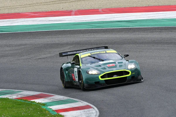 stock image Scarperia, 2 April 2023: Aston Martin DBR9 year 2006 in action during Mugello Classic 2023 at Mugello Circuit in Italy.