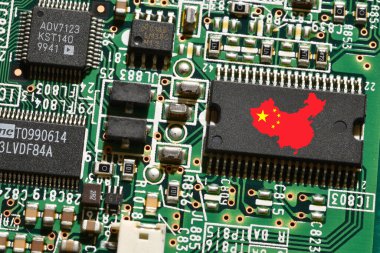 China flag on a processor, central processing unit CPU or GPU microchip on a motherboard or graphic card. Concept for the battle of global microchips production between China, Taiwan, Korea and USA.