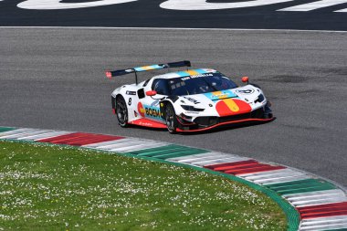 Scarperia, 23 March 2024 Italy: Ferrari 296 GT3 of Team Boem by Kessel Racing drive by Cutrera-Talarico-Frezza-Fumanelli in action during 12h Hankook at Mugello Circuit. clipart