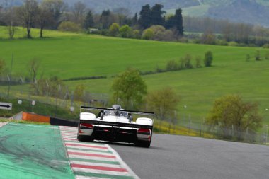 Scarperia, 5 April 2024: Peugeot 905 Evo 1 Bis group C year 1991 in action during Mugello Classic 2024 at Mugello Circuit in Italy. clipart