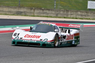 Scarperia, 5 April 2024: Jaguar XJR-10 1990 group C year 1990 in action during Mugello Classic 2024 at Mugello Circuit in Italy. clipart
