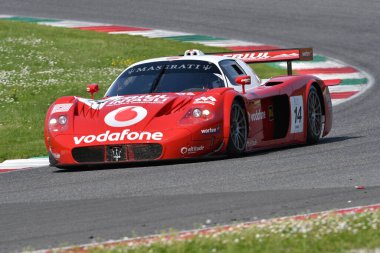 Scarperia, 5 April 2024: Maserati MC12 GT1 year 2005 in action during Mugello Classic 2024 at Mugello Circuit in Italy. clipart