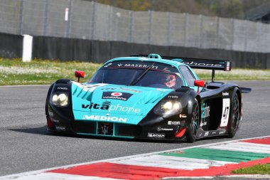 Scarperia, 5 April 2024: Maserati MC12 GT1 year 2005 in action during Mugello Classic 2024 at Mugello Circuit in Italy. clipart