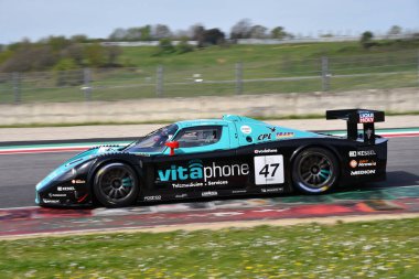 Scarperia, 5 April 2024: Maserati MC12 GT1 year 2005 in action during Mugello Classic 2024 at Mugello Circuit in Italy. clipart