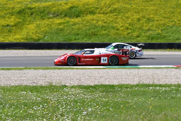 stock image Scarperia, 5 April 2024: Maserati MC12 GT1 year 2005 in action during Mugello Classic 2024 at Mugello Circuit in Italy.