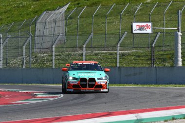 Scarperia, 23 March 2024 Italy:  BMW M4 GT4 (G82) of Team Hofor Racing by Bonk drive by Kroll-Mayer-Partl in action during 12h Hankook at Mugello Circuit. clipart