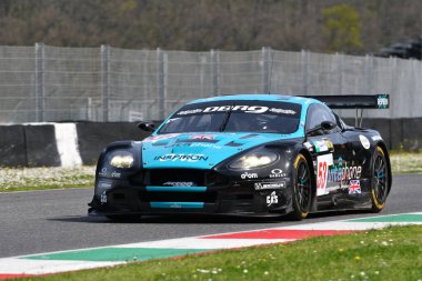 Scarperia, 5 April 2024: Aston Martin DBR9 year 2006 in action during Mugello Classic 2024 at Mugello Circuit in Italy. clipart