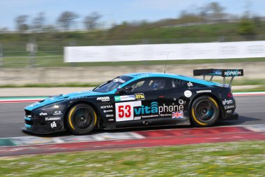 Scarperia, 5 April 2024: Aston Martin DBR9 year 2006 in action during Mugello Classic 2024 at Mugello Circuit in Italy. clipart