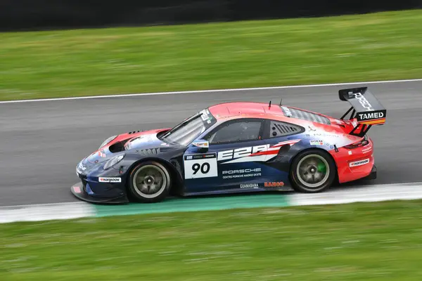 stock image Scarperia, 23 March 2024 Italy: Porsche 911 GT3 R (991 II) of Team E2P Racing drive by Burguera-Sainero-Parente in action during 12h Hankook at Mugello Circuit.