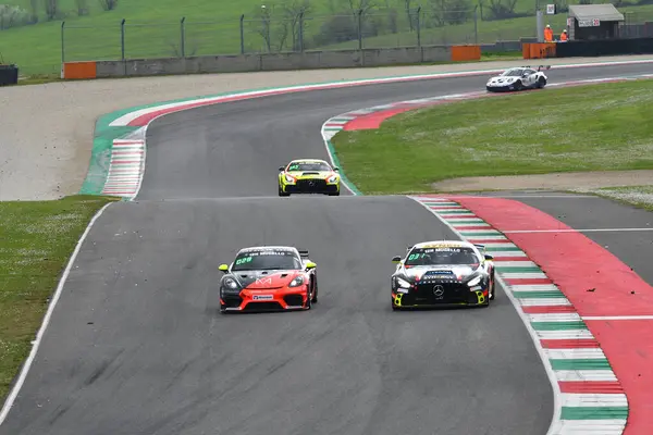 stock image Scarperia, 23 March 2024 Italy: Porsche 718 Cayman GT4 RS of Team Lionspeed GP drive by Garcia-Miller-Kolb-Bohn in action during 12h Hankook at Mugello Circuit.