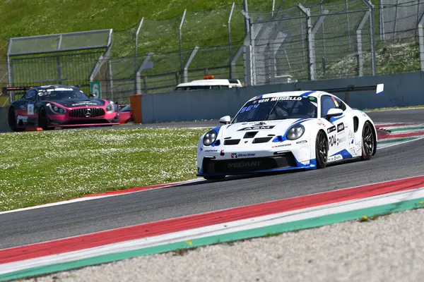 stock image Scarperia, 23 March 2024 Italy: Porsche 911 GT3 Cup (992) of Team Red Ant Racing drive by Guelinckx-Verheyen-Haverans in action during 12h Hankook at Mugello Circuit.