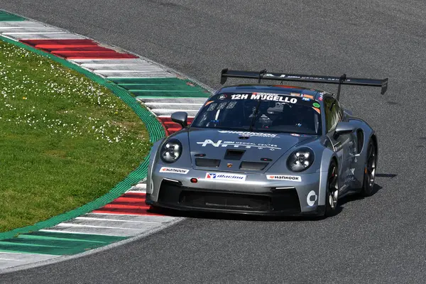 stock image Scarperia, 23 March 2024 Italy: Porsche 911 GT3 Cup (992) of Team Hankook Competition drive by Bruins-Cho-Kim in action during 12h Hankook at Mugello Circuit.