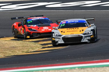 Scarperia, Italy - August 23th 2024: AUDI R8 LMS of team TRESOR AUDI SPORT ITALIA drive by Mazzola-Delli Guanti in action during qualifyng session at Mugello Circuit clipart