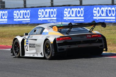 Scarperia, Italy - August 23th 2024: AUDI R8 LMS of team TRESOR AUDI SPORT ITALIA drive by Mazzola-Delli Guanti in action during qualifyng session at Mugello Circuit clipart