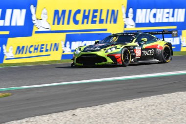 Scarperia, Italy - September 29th 2024: Aston Martin Vantage AMR LMGT3 of team RACING SPIRIT OF LEMANS drive by DEBOER-STEVENSON-HASSE CLOT in action during 4h of Mugello. clipart