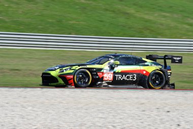 Scarperia, Italy - September 29th 2024: Aston Martin Vantage AMR LMGT3 of team RACING SPIRIT OF LEMANS drive by DEBOER-STEVENSON-HASSE CLOT in action during 4h of Mugello. clipart