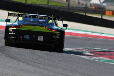 Scarperia, Italy - September 29th 2024: Aston Martin Vantage AMR LMGT3 of team RACING SPIRIT OF LEMANS drive by DEBOER-STEVENSON-HASSE CLOT in action during 4h of Mugello. clipart