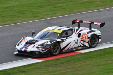 Scarperia, Italy - September 29th 2024: Ferrari 296 LMGT3 of team AF CORSE drive by SAMANI-COLLARD-VARRONE in action during 4h of Mugello. clipart