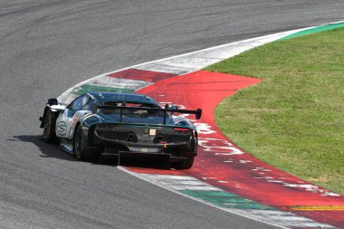 Scarperia, Italy - September 29th 2024: Ferrari 296 LMGT3 of team SPIRIT OF RACE drive by CAMERON-PEREL-GRIFFIN in action during 4h of Mugello clipart