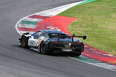 Scarperia, Italy - September 29th 2024: Ferrari 296 LMGT3 of team SPIRIT OF RACE drive by CAMERON-PEREL-GRIFFIN in action during 4h of Mugello clipart