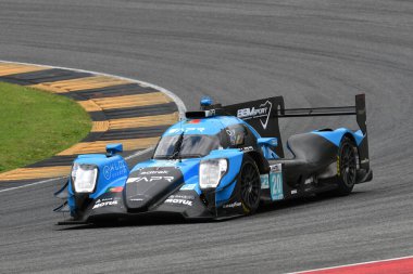 Scarperia, İtalya - 29 Eylül 2024: LENTOUDIS-BRADLEY-QUINN 'in ALGARVE PRO RACING takımından Oreca 07 Gibson Mugello' nun 4h..