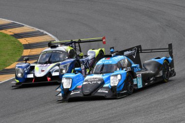Scarperia, İtalya - 29 Eylül 2024: LENTOUDIS-BRADLEY-QUINN 'in ALGARVE PRO RACING takımından Oreca 07 Gibson Mugello' nun 4h..
