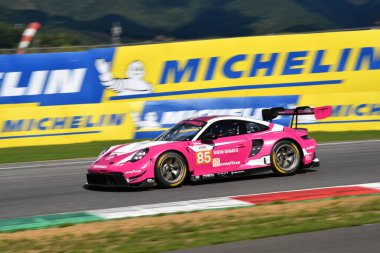 Scarperia, Italy - September 29th 2024: Porsche 911 GT3 R LMGT3 of team IRON DAMES drive by BOVY-FREY-GATTING in action during 4h of Mugello. clipart