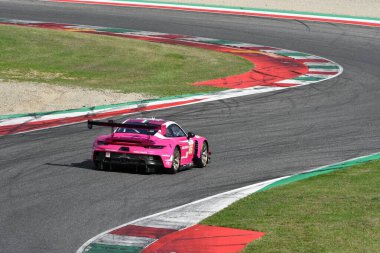 Scarperia, Italy - September 29th 2024: Porsche 911 GT3 R LMGT3 of team IRON DAMES drive by BOVY-FREY-GATTING in action during 4h of Mugello. clipart