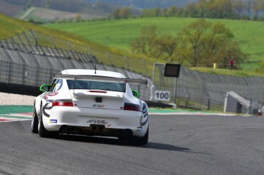 Scarperia, 5 April 2024: Porsche 996 GT3-RSR year 2006 in action during Mugello Classic 2024 at Mugello Circuit in Italy. clipart