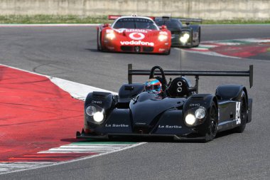 Scarperia, 5 April 2024: Courage C60 year 2005 in action during Mugello Classic 2024 at Mugello Circuit in Italy. clipart