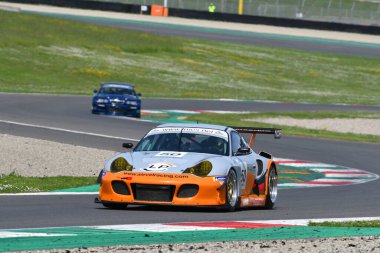 Scarperia, 5 April 2024: Porsche 996 RSR TT year 2006 in action during Mugello Classic 2024 at Mugello Circuit in Italy. clipart