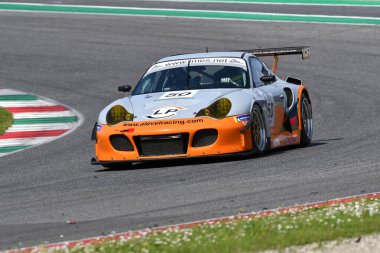 Scarperia, 5 April 2024: Porsche 996 RSR TT year 2006 in action during Mugello Classic 2024 at Mugello Circuit in Italy. clipart