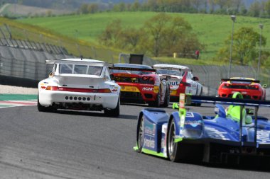 Scarperia, 5 April 2024: Porsche 993 GT2 year 1996 in action during Mugello Classic 2024 at Mugello Circuit in Italy. clipart