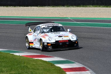 Scarperia, 5 April 2024: Porsche 993 GT2 Evo year 1999 in action during Mugello Classic 2024 at Mugello Circuit in Italy. clipart